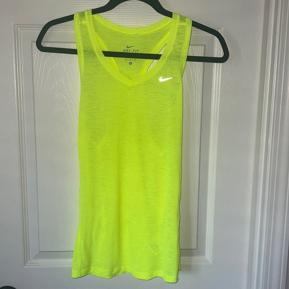 Neon yellow Nike tank top. Great for nighttime runs